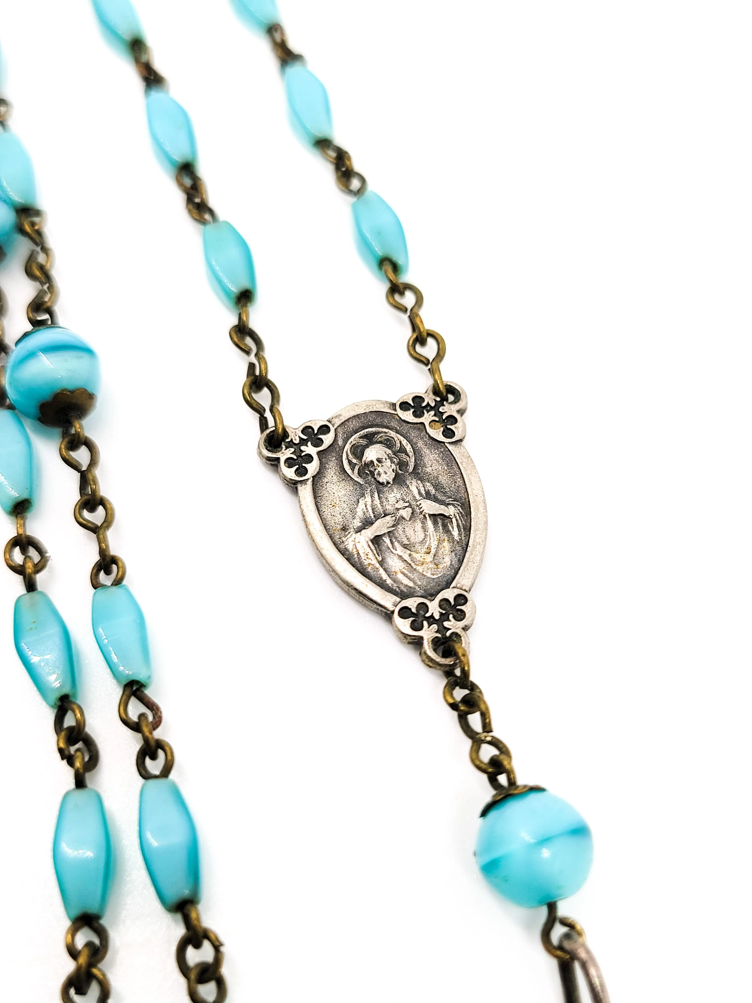 Blue satin glass vintage silver toned crucifix with clover accents